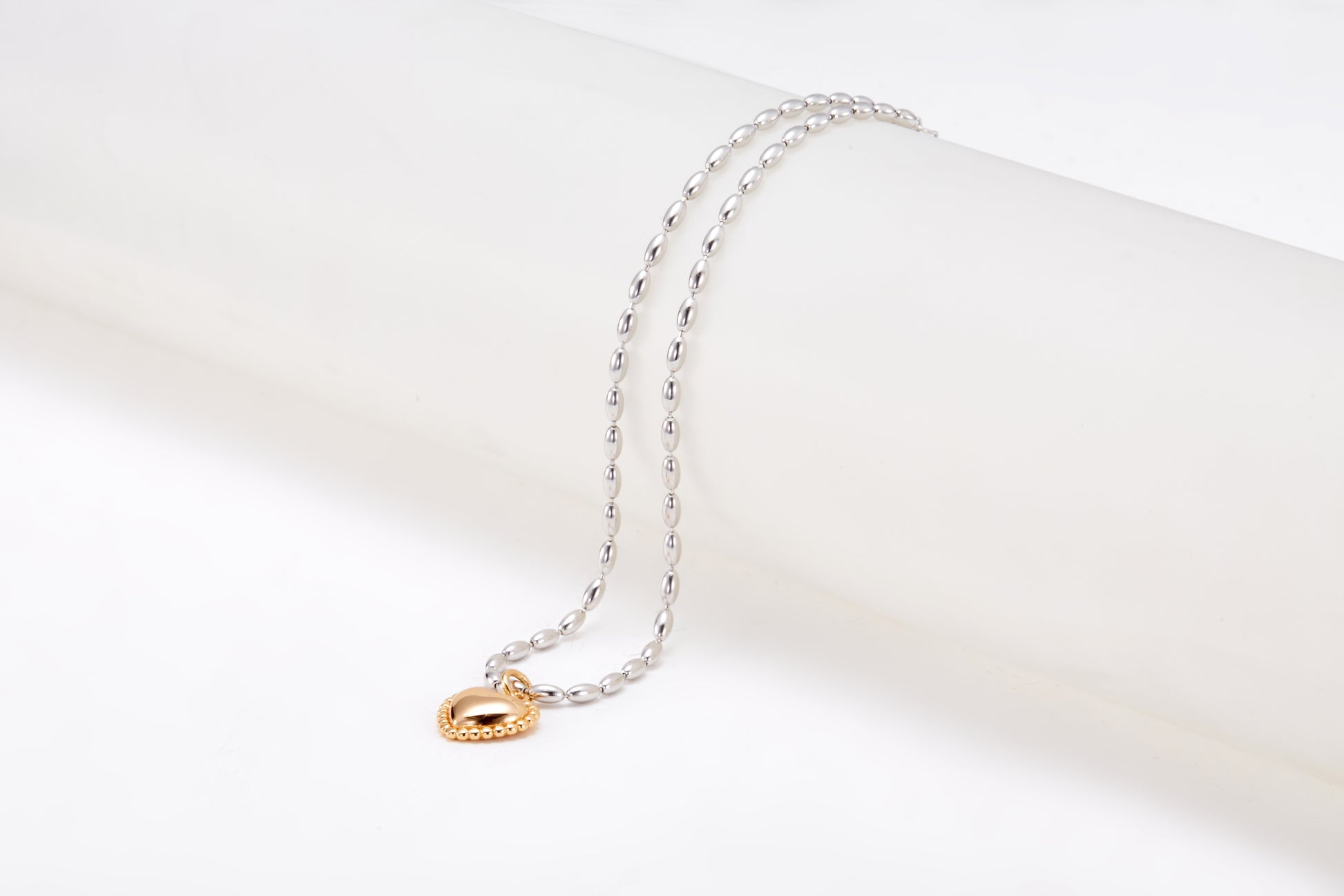 Silver and Gold-plated necklace in a shape of a heart for girls and women 